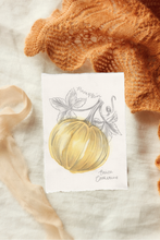 Load image into Gallery viewer, A small art featuring a hand-drawn yellow pumpkin with gray leaves, styled on a white fabric background with an orange knit blanket and beige ribbon.work